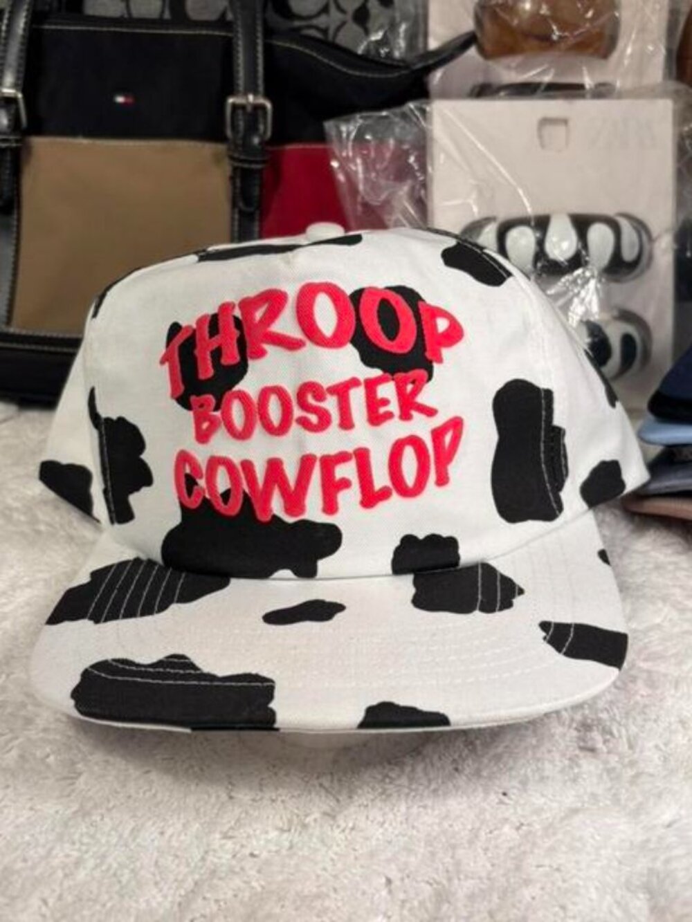 Throop boost cow flow and black cow print cap